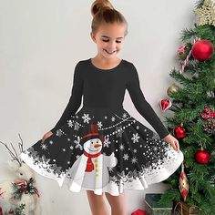 Season:Winter,Fall; Fabric:Polyester; Sleeve Length:Long Sleeve; Dress Length:Above Knee; Look After Me:Machine wash; Gender:Girls'; Style:Casual,Cute,Beautiful; Elasticity:Micro-elastic; Occasion:Sports  Outdoor,Vacation,Holiday,Daily; Kids Apparel:Snowflake Dress,Dress,Christmas Dress; Age Group:Kids; Fit Type:Regular Fit; Dresses Type:A Line Dress,Casual Dress; Pattern:Snowflake,Santa Claus,Snowman; Design:Print; Age:3-12 Years; Listing Date:10/18/2023; Bust:; Length:; Neck:; Sleeve:; Waist:; 3d Santa Claus, Kids Christmas Dress, Snowflake Dress, Simple Homecoming Dresses, Snowman Snowflake, Womens Basic Tops, Snowman Design, Outdoor Vacation, Dress Christmas