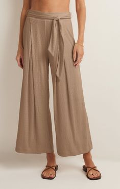 Take your casual look to the next level with the elevated, wide leg Isla Pucker Knit Pant. This pull on style features flattering details that will make this a pant you reach for on repeat. Solid Wide Leg Pants For Day Out In Fall, Chic High-waisted Wide Leg Pants, Solid Wide Leg Pants For Fall Day Out, Wide Leg Solid Color Pants For Fall Day Out, Chic Wide Leg Pants With Pull-on Style For Fall, Fall Wide Leg Pull-on Pants, Chic Wide Leg Pants For Loungewear, Beige Wide Leg Pants For Day Out, Chic Wide Leg Pull-on Pants For Day Out