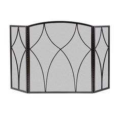 an iron fireplace screen with decorative designs on the front and back panels, in black