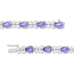 Capture the dreamy aura of gemstones in pastel hues with this remarkable bracelet from the Gems of Serenity™ collection. Mesmerizing pear-shaped blue lab-created sapphires are nestled with round and marquise-cut white lab-created sapphires in a leaf-like design. Crafted in polished sterling silver with a rhodium finish, this 7.25-inch bracelet secures with a box clasp. White Lab, Box Clasp, Sapphire Bracelet, Bracelet Sterling Silver, Pastel Hues, Marquise Cut, Sterling Silver Bracelets, Pear Shaped, A Box