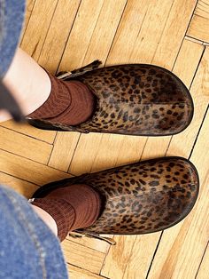 Barefoot clogs with a movable strap. You can wear these leopard print clogs either with a strap around the heel for better fixation, securing it around the ankle, or at the front, like mules. Crafted in pile leather with leopard print, featuring a genuine leather lining inside. A bulky buckle serves as the main accent. Light polyurethane voluminous sole. Round toe. PRODUCT INFORMATION Upper: pile leather with leopard print Lining: leather Sole: anatomical polyurethane sole * the model is undersi Womens Clogs And Mules, Clogs For Women, Birkenstock Style, Accent Light, Clogs And Mules, Platform Mules, Clog Shoes, Platform Clogs, Leather Work