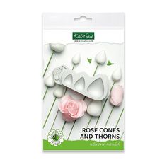 a package of rose cones and thorns on a white background with pink flowers in the middle