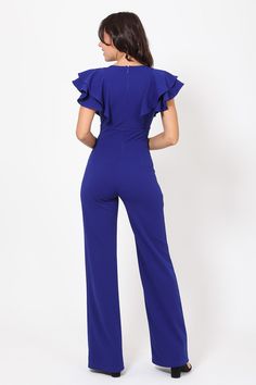 Bella Chics' Royal Blue Jumpsuit with a layered ruffle shoulder is a showstopper. This short sleeve jumpsuit has buckle detail and a plunging v-neck to show off your sexy side. The joint double d-ring trim detail cinches your waist and flows into front-line flared wide leg pants for an elegant look. -Royal Blue Jumpsuit - Bella Chic- Layered Ruffle Shoulder Jumpsuit w/ Buckle Detail- Plunging V, Joint Double D Ring Trim on Waist- Front-line Flared Leg Design, Zipper on Back CONTENTS & CARE- 95% Elegant Short Sleeve Romper With Ruffles, Elegant Blue Jumpsuits And Rompers With Ruffles, Blue V-neck Jumpsuit With Ruffles, Blue Short Sleeve Jumpsuit For Night Out, Blue Short Sleeve Jumpsuits And Rompers For Night Out, Royal Blue Jumpsuit, Short Sleeve Jumpsuit, Sequin Rompers, Blue Jumpsuit