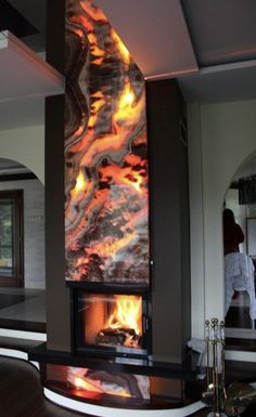 a fire place in the middle of a living room