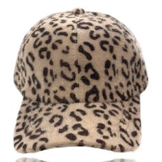 Dani & EmFuzzy Leopard Baseball Cap An adorable faux fur fuzzy leopard baseball cap.This super stylish cosy hat will keep you looking good and feeling warm. Comfortable and fashionable and perfect for casual wear, daily wear, outer wear, work wear, travel, and sport’s. Features a soft faux fur material which will keep your head warm and adds that special accent touch to any favorite top, sweater, jeans, winter coat, jacket, vest, scarf or more. An absolutely gorgeous addition to any wardrobe! One Size - Circumference: 56cm-60cm/22.0"-23.6"; Adjustable; Great fit for most teens and adults. Design : The leopard print baseball hat features an all over leopard print design Casual Faux Fur Winter Hat, Trendy Winter Outdoor Baseball Cap, Trendy Brown Baseball Cap For Winter, Trendy Brown Winter Baseball Cap, Casual Faux Fur Beanie Hat, Casual Faux Fur Beanie, Trendy Winter Baseball Cap, Trendy Winter Flat Cap Baseball Cap, Trendy Winter Baseball Cap With Curved Brim