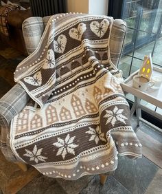 a blanket that is on top of a chair