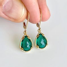 Emerald Quartz Earrings, May Birthstone, Dark Green Teardrop Earrings in Gold or Silver, Hunter Green Fancy Jewelry, Holiday Gift for women These small but gorgeous earrings feature deep green Emerald Quartz teardrops bezel framed in either 14k gold filled or sterling silver. The teardrops are suspended form lever back ear wires in the finish of your choice. These are small, delicate and dainty earrings but with a gorgeous deep hunter green color sure to match many outfits. Ideal for a girl or a Green Teardrop Birthstone Earrings, Party Earrings With Birthstone, May Birthstone Teardrop Jewelry For Parties, Crystal Earrings For May Birthstone Gift, Teardrop Earrings For May Birthstone Gift, May Birthstone Teardrop Earrings, Teardrop May Birthstone Earrings With Ear Wire, Teardrop Birthstone Earrings For Jewelry Making, May Birthstone Gemstone Teardrop Earrings