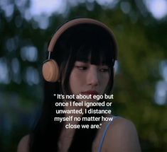 a woman wearing headphones with a quote on it