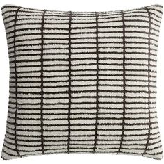 a black and white striped pillow on a white background with brown lines in the middle