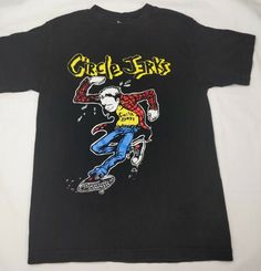 a black shirt with a drawing of a skateboarder on it