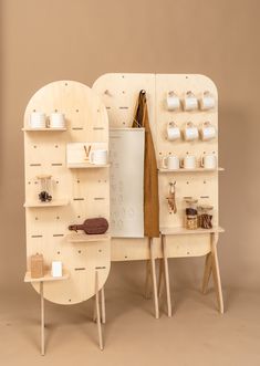 two wooden shelves with items on them and one shelf is made out of plywood