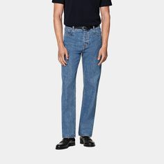 These dark blue Charles fit jeans are tailored to a regular fit with a straight leg-loosening up the overall aesthetic for a more relaxed take on a classic pair. Blue Jeans With Belt Loops And Straight Shape, Blue Straight Jeans With Belt Loops, Classic Jeans With Button Closure And Straight Hem, Classic Straight Hem Jeans With Button Closure, Classic Jeans With Button Closure, Classic Straight Blue Jeans, Modern Jeans With Belt Loops Standard Cut, Modern Jeans With Belt Loops And Standard Cut Leg, Modern Blue Straight Leg Jeans