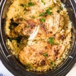 chicken and rice in a crock pot with parsley