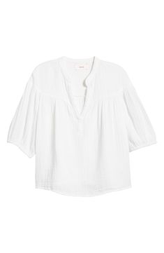 An all-cotton fabrication offers a light and airy feel in a split-neck top featuring a gauzy texture for added dimension. 24" length Band collar Split neck Short sleeves with elastic cuffs 100% cotton Machine wash, line dry Made in the USA Spring Cotton Gauze Tops With Relaxed Fit, Spring Relaxed Fit Cotton Gauze Tops, Relaxed Fit Cotton Gauze Tops For Spring, Summer Cotton Gauze Blouse With Relaxed Fit, Relaxed Fit Cotton Gauze Blouse For Summer, Spring Linen Tops With Crinkle Texture, Linen Blouse With Crinkle Texture, White Henley Neckline Top For Spring, Summer Long Sleeve Cotton Gauze Tops