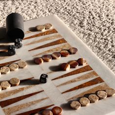 a table topped with lots of different types of rocks and stones on top of it