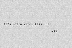 the words it's not a race, this life are printed on white paper