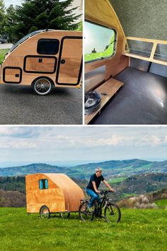 a man riding a bike next to a small camper