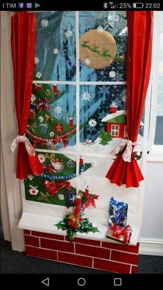 an open window decorated with christmas decorations