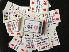 playing cards with words on them sitting on a table