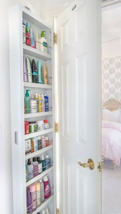 the door is open to reveal an organized closet