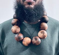 Custom hand made wooden beads. Comes in small, medium large as shown in the picture. Gray, brown, or black options are available also. Charm Necklaces, African Beads, Wooden Beads, Brown Color, Favorite Jewelry, Charm Necklace, Hand Made, Etsy Accessories, Handmade Items