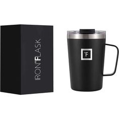 a black travel mug next to a box and the logo for ron flask on it