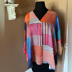 Umgee Striped Colorblock Great Condition V Neck Silk Material Multicolor V-neck Color Block Blouse, Trendy Multicolor Color Block Blouse, Multicolor Color Block Beach Tops, Multicolor Color Block Tops For Vacation, Blue Color Block Tops For Vacation, Blue Color Block Vacation Tops, Casual Multicolor Color Block Blouse, Multicolor Patchwork Blouse For Vacation, Open Shoulder Blouse