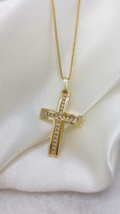 Diamonds Cross Necklace. A handmade 14k or 18k Diamond Gold Cross  with total Diamonds 0,25ct A solid gold cross with a with a shiny surface and a cross created in the center of diamonds. An elegant gold cross ideal as the first jewelry for a baby girls as a baptismal cross and for any other circumstance like wedding - engagement - graduation Details: Height:  30mm Width:17mm Weight:Approximately  4.1gr 14k - 4.6gr 18k Metal:14k or 18k Yellow Gold  Style:Baptism Cross - Bridal Jewelry  ❣️ For mo Gold Cubic Zirconia Crucifix Necklace, Yellow Gold Cubic Zirconia Crucifix Jewelry, Yellow Gold Crucifix Jewelry With Cubic Zirconia, Gold Diamond Crucifix Jewelry, Gold Jewelry With Vvs Clarity Cross Pendant, Yellow Gold Cubic Zirconia Cross Jewelry, Yellow Gold Cubic Zirconia Cross Pendant, Gold Vvs Clarity Cross Pendant Jewelry, Spiritual Yellow Gold Necklaces For Wedding