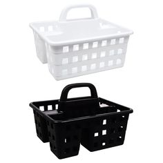 two black and white baskets sitting next to each other