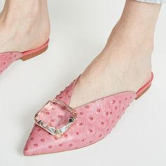 Elevate your style with these Pink Faux Ostrich Leather Flat Mules. Featuring a pointy toe, crystal square buckle detail, and faux ostrich leather, these flats exude sophistication and charm effortlessly. Color: Pink Material: Faux leather Toe: Peep Toe Faux crystal square buckle embellishment Handcrafted US sizing. Fits true to size. Pointed Flats Shoes, Ugly Shoes, Funky Shoes, Rhinestone Flats, Buckled Flats, Pointed Flats, Sandal Shoes, Flat Mules, Ostrich Leather