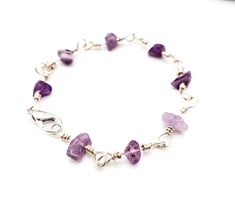 Sterling Silver Amethyst Bracelet Amethyst jewelry has an undeniably calming energy, and this bracelet is no exception! Enjoy the calming vibes with this handmade Amethyst sterling silver bracelet, made with .925 sterling silver and amethyst chip beads! 💜 Your Amethyst sterling silver bracelet will be made to order just for you, so there will be variations in the amethyst crystals from the stock photos. Standard size is 8 inches, but if you need a different size please leave a note at checkout. Amethyst Crystals, Wire Wrapped Bracelet, Sterling Silver Wire Wrap, Handmade Wire Jewelry, Message Jewelry, Amethyst Jewelry, Amethyst Bracelet, Chip Beads, Amethyst Stone