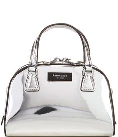 From kate spade new york&#x2C; the Sam Icon Silver Metallic Leather Mini Duffle Satchel Bag features:Lining: Faille Hardware: PlaqueInterior: 3 CC slotsExterior: Detachable and removable strapClosure: Zip top closureDimensions (depth x width x height) (in): approx. 3.39'' D x 7.4''W x 4.88''HHandle drop length approx. (in): 2.75"Strap drop length approx&#046 Silver Handbag, So Kate, Perfect Handbag, Satchel Bag, Dillard's, Metallic Leather, Leather Mini, Kate Spade New York, Satchel Bags