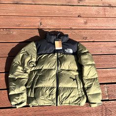 Brand New Never Worn Got As A Gift But Was To Small :( The North Face Green Winter Outerwear, Green Winter Outerwear By The North Face, Northface Puffer Coat, Northface Puffer, Olive Green Color, The North Face Jackets, North Face Jackets, North Face Jacket, Puffer Coat