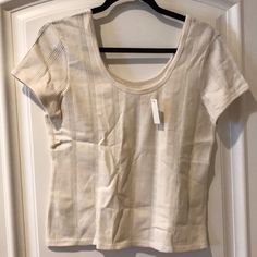 Brand New With Tags On. Size M. 58% Cotton 42% Polyester. Open To Any Reasonable Offer Fitted Tan T-shirt For Spring, Scoop Neck Cotton Short Sleeve Top For Spring, Basic Cotton Knit Top For Summer, Cream Stretch Crew Neck Top, Cream Stretch Short Sleeve Tops, Cream Stretch Tops With Short Sleeves, Spring Cream Tops With Crew Neck, Basic Fitted Knit Top For Summer, Fitted Beige Top For Everyday