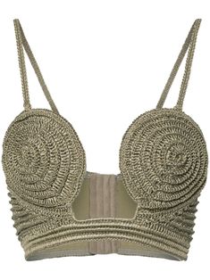 a woman's bra top with braids on it