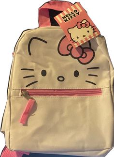 Cat Design Backpack For End Of School Year, Playful White Bag With Zipper Closure, Cute Hello Kitty Rectangular Backpack, Hello Kitty Rectangular Backpack For Back To School, White School Bag With Cat Design, White Hello Kitty Backpack For Everyday Use, Playful White Student Backpack, Playful White Backpack, Cute White Backpack With Zipper Closure