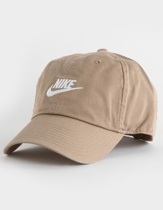 Nike Club Strapback Hat. Nike Logo Embroidery On Front. 6-Panel Strapback Hat. Curved Visor. 100% Cotton. Machine Wash. Imported. Nike Casual Snapback Hat For Baseball Season, Casual Nike Snapback For Baseball Season, Casual Nike Adjustable Snapback Hat, Nike Casual Trucker Hat With Curved Brim, Nike Snapback Hats For Spring, Casual Nike Snapback Trucker Hat, Beige Nike Hat, Casual Nike Baseball Cap, Nike Cap For Spring