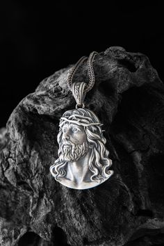 Handmade 925K Sterling Silver Jesus Necklace , This Necklace is pretty ideal for casual daily use.Silver Oxidized to reveal details of the craftsmanship. Jesus Silver Pendant, Religious Jewelry, Jesus Head Necklaces, Jesus Christ Pendants, Colgante de plata de Jesús, Open eye Jesus Lord Exquisite and detailed silver Jesus head pendant High-quality craftsmanship with attention to detail Made from premium silver material for durability and shine Comes with a durable chain for easy wearing Perfect for daily wear or as a meaningful gift for religious occasions Item Details Gender : Male / Female / Unisex Material : 925K Sterling Silver Pendant Weight : 12-14 Gr. Finish: Oxidized / Yellow Gold Plated / Rose Gold Plated / Silver Rhodium Plated / Black Rhodium Plated Bail with: Suitable for up to Thorn Crown, Jesus Necklace, Jesus Christus, Custom Pendants, Catholic Gifts, Silver Jewelry Pendant, Religious Jewelry, Gold Plated Silver, Sterling Silver Pendant