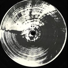 a black and white photo of a disc