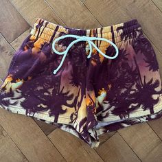 Urban Outfitters Drawstring Lounge Shorts. Size Extra Small. Cute Palm Tree Design Never Worn Summer Purple Bottoms For Beach, Purple Bottoms For Vacation Beach Season, Purple Vacation Bottoms For Beach Season, Purple Bottoms For Beach Vacation, Casual Purple Bottoms For Summer, Purple Beach Vacation Bottoms, Summer Beach Bottoms In Purple, Purple Shorts With Elastic Waistband For Summer, Casual Purple Beach Bottoms