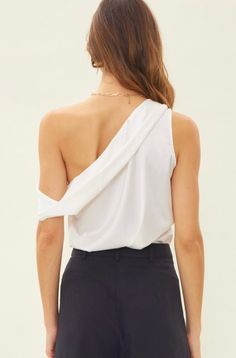 Available for local pickup in Baton Rouge, Louisiana -satin -one shoulder -folded neckline Model is wearing a size small With Love<3 Summer Satin One-shoulder Top, Flirty Fitted One-shoulder Tops, Chic Asymmetrical One-shoulder Fitted Top, Ruched One-shoulder Top With Asymmetrical Neckline, Luxury One-shoulder Top With Ruched Asymmetrical Neckline, Satin Blouse, White Satin, One Shoulder Tops, Bra Cups