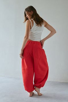 Updated Out From Under sweatpant in a barrel-leg, jogger style. Designed in a so sot fleeced knit featuring a low-rise elasticized waist, drawstring tie and wide barrel legs that cinch at the ankles. Only at Urban Outfitters. Features Out From Under Kai Extreme barrel jogger Barrel leg pant Soft and stretchy fleeced knit Low rise elasticized waist with tie Wide barrel leg Cinched hems Oversized, relaxed fit Cropped length Easy pull-on style UO exclusive Content + Care 58% Cotton, 42% polyester M Barrel Leg Pants, Barrel Pants, Cropped Sweatpants, Red Fits, Fashion Joggers, Red Outfit, Small Waist, Jeans For Sale, Jogger Pants