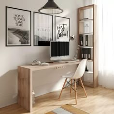 a desk with a computer on top of it in front of two framed pictures and a lamp