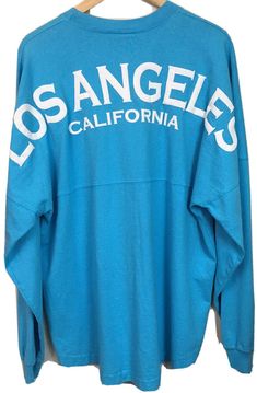 Long Sleeve Los Angeles California Spirit Jersey Tshirt Women’s L Sail Blue Nwt. Puffy Spellout On The Back, A Classic Spirit Activewear, Spirit Jersey Usa Patent Design. Labeled On The Tag As A Spirit Football Jersey, This Sail Blue Colored Shirt Is Eye Catching! Size Large Made In Usa. Weighs ~ 14.7oz Measurements: Pit To Pit: 26” Front Length: 27” Back Length: 30.5” Sleeve Length From Pit: 19” Although Nwt, This Item Is Not Originally Ours From New. Throughout The Life Of This Item, It May Ha Jersey Tshirt, Tshirt Women, Spirit Jersey, Easy Spirit, Blue Sweatshirt, Los Angeles California, Colorful Shirts, Long Sleeve Tops, Active Wear