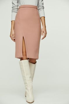 This salmon colour winter pencil skirt is crafted in faux mouflon style coat fabric. It has a 4cm wide waistband in the same fabric with darts below in the back. There is an off-centre slit in the front. It fastens in the back with a concealed zip. This pencil skirt is knee length and fully lined. Wear with a fitted jersey top or, for a more formal office look, with a blouse and jacket. Heels and an off-shoulder top will take this skirt and you for a night on the town! Dry clean. Mild detergent. Winter Pencil Skirt, Salmon Colour, Formal Office, Style Coat, Salmon Color, Gold Stone, Professional Women, Fine Jewelry Designers, Jersey Top