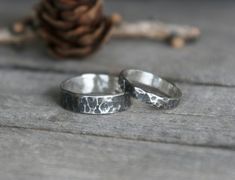 These beautiful organic bands are made of sterling silver which has been hammered and given a dark antique or a satin silver finish. Very comfortable to wear with a unique handmade rustic look, ideal as an every day ring or as wedding or couple rings.  You can choose the 3mm, 5mm or 8mm width for your ring or the bands set you prefer. If you prefer a different finish for your ring(s), please let me know in a message. All our jewelry is made in our studio by hand and we use only traditional silve Rustic Hand Forged Promise Ring, Rustic Hand Forged Rings For Anniversary, Rustic Hand Forged Wedding Rings, Rustic Hammered Jewelry For Anniversary, Rustic Sterling Silver Rings For Anniversary, Rustic Silver Wedding Rings, Rustic Sterling Silver Rings In Silver Color, Rustic Silver Promise Ring, Rustic Hand Forged Silver Rings