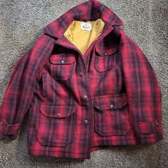 The Most Beautiful And Vintage Woolrich Plaid Wool Coat Featuring 6 Pockets In The Front And Two Pockets In The Back! Mens Jacket But Of Course Can Be Women's As Well! Has Ware, A Small Stain On Inside, A Name Written On The Logo Tag. It Is In Good Shape For Age. Size 46 Beautiful Vintage Condition Would Say This Is At Least 50's Or Earlier! Questions? Leave A Comment Below! Vintage Wool Coat, Plaid Wool Coat, Vintage Woolrich, Logo Tag, Red And Black Plaid, Wool Plaid, Black Plaid, Vintage Wool, Wool Coat