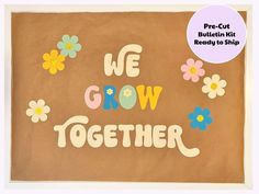 we grow together pre - cut bulletin board with flowers and the words we grow together