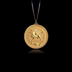 Embrace regal elegance with our Pahlavi Lion Pendant, beautifully crafted from the finest solid gold. This pendant features a detailed lion, symbolizing courage and royal power, capturing the essence of ancient Persian heritage. PENDANT INFORMATIONThis pendant is made of real, solid gold.• Made in USA• Material: 14k or 18k solid gold• Finish: polished• Height: 1.13" (29 cm) x Width: 1" (26 mm)• Pendant weight: approx. 6 grams (14k)• Bail: fits up to 4 mm chains• Solid back, not hollow• A certifi Lion And Sun, Ancient Yellow Gold Medallion Necklace, Luxury Ancient Style Pendant Jewelry, Persian Necklace, Gold Lion Necklace, Lion Locket For Men, Gold Lion Pendant Jewelry, Lion Necklace, Phoenix Pendant