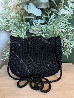 Simple and elegant beaded purse, perfect for engagement party or after the wedding. 7x6 inches Elegant Handmade Evening Shoulder Bag, Elegant Evening Handmade Shoulder Bag, Black Beaded Evening Bag For Wedding, Elegant Beaded Formal Bags, Formal Beaded Rectangular Shoulder Bag, Elegant Beaded Shoulder Bag For Events, Elegant Beaded Rectangular Evening Bag, Elegant Beaded Evening Bag For Formal Events, Elegant Beaded Shoulder Bag For Wedding